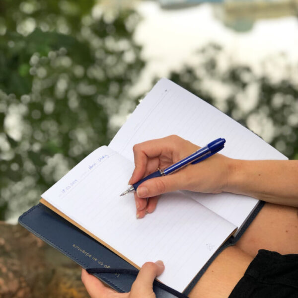 Writing in notebook Vietnam