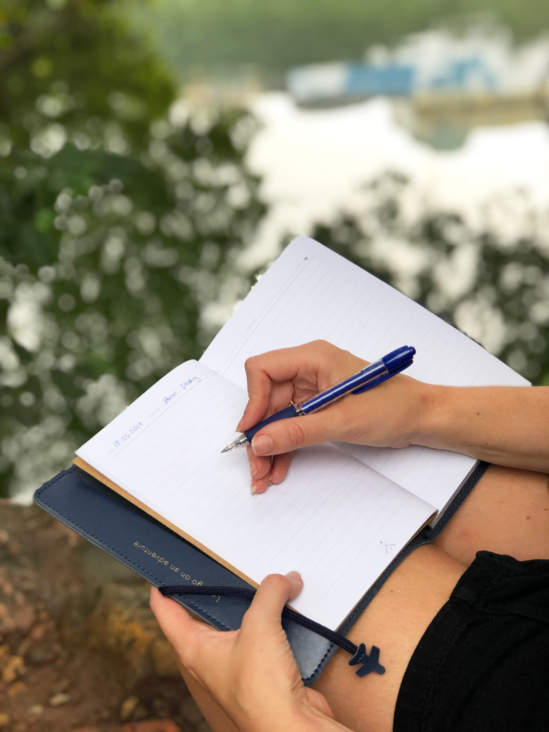 Writing in notebook Vietnam